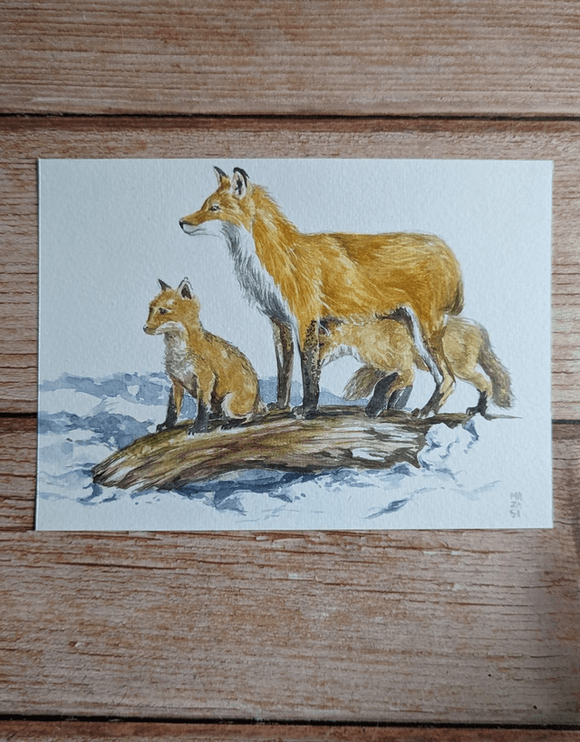 Maman renard et ses deux petits 