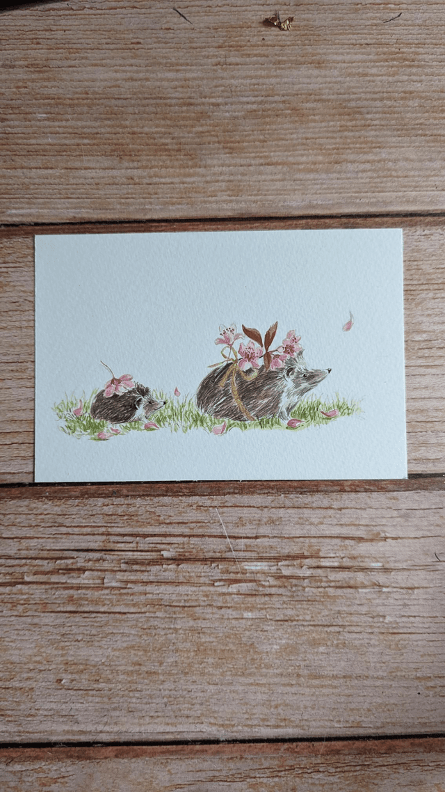 Maman et bébé hérisson aux sakura
