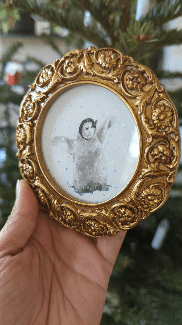 Petit manchot sous la neige 